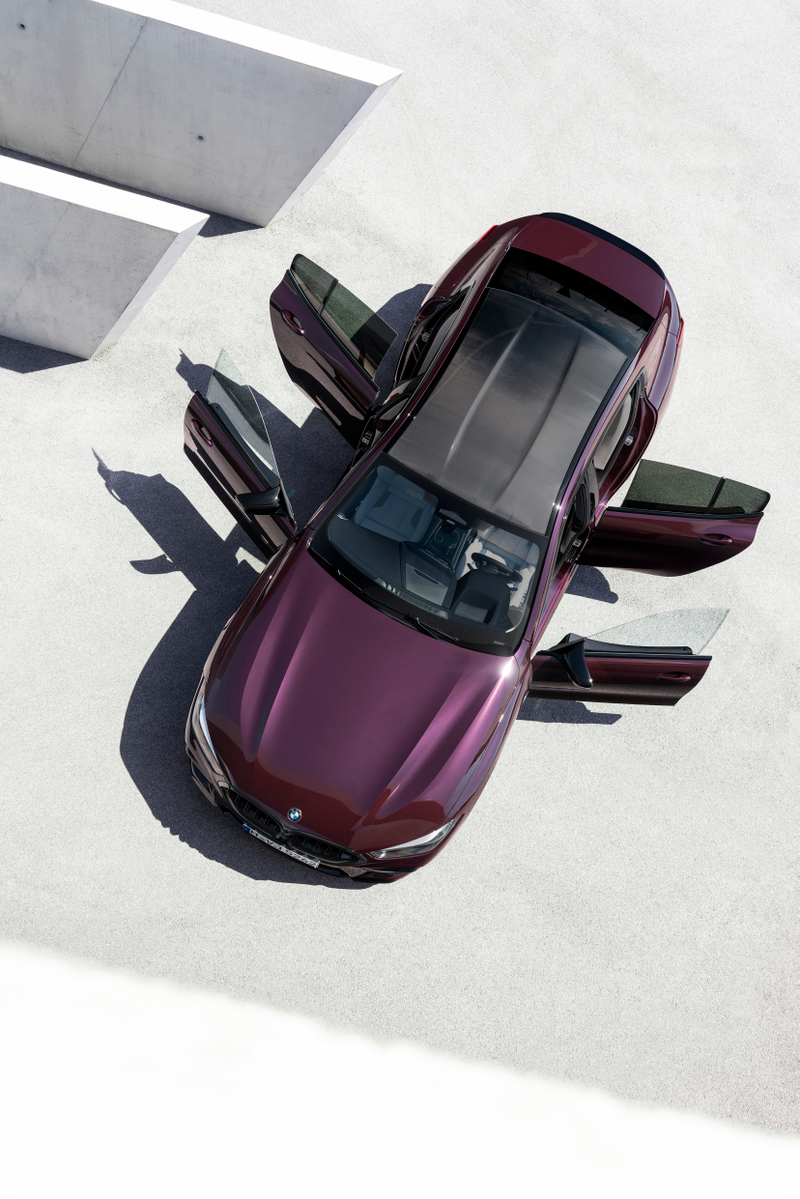 Illustration for article with the Title Look how purple this 600hp BMW M8 Gran Coupe is